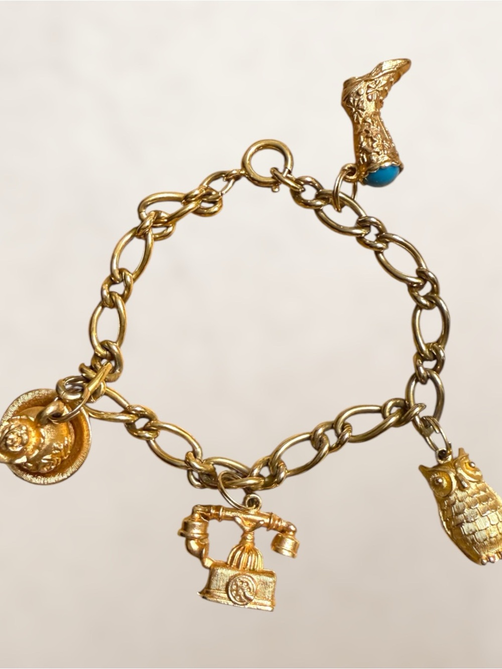 Gold-Tone Charm Bracelet with Owl, Telephone & Hat Charms - Blue Accent